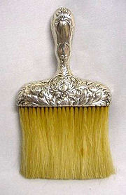 Sterling Repousse Clothing Brush